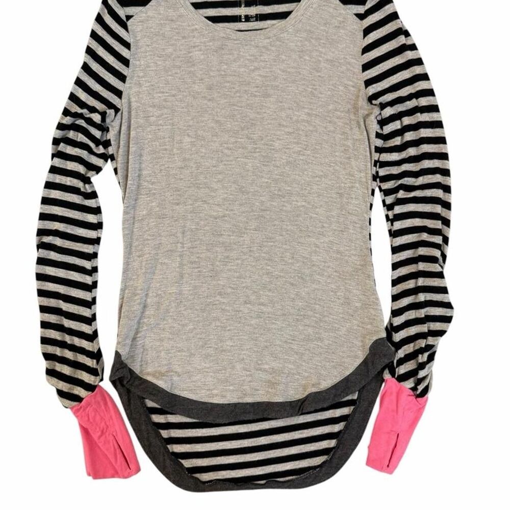 Black and gray striped long sleeve shirt with pink accents